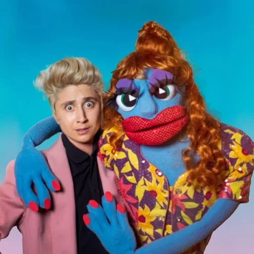 Zack and Ticklemuff posing together against a blue background